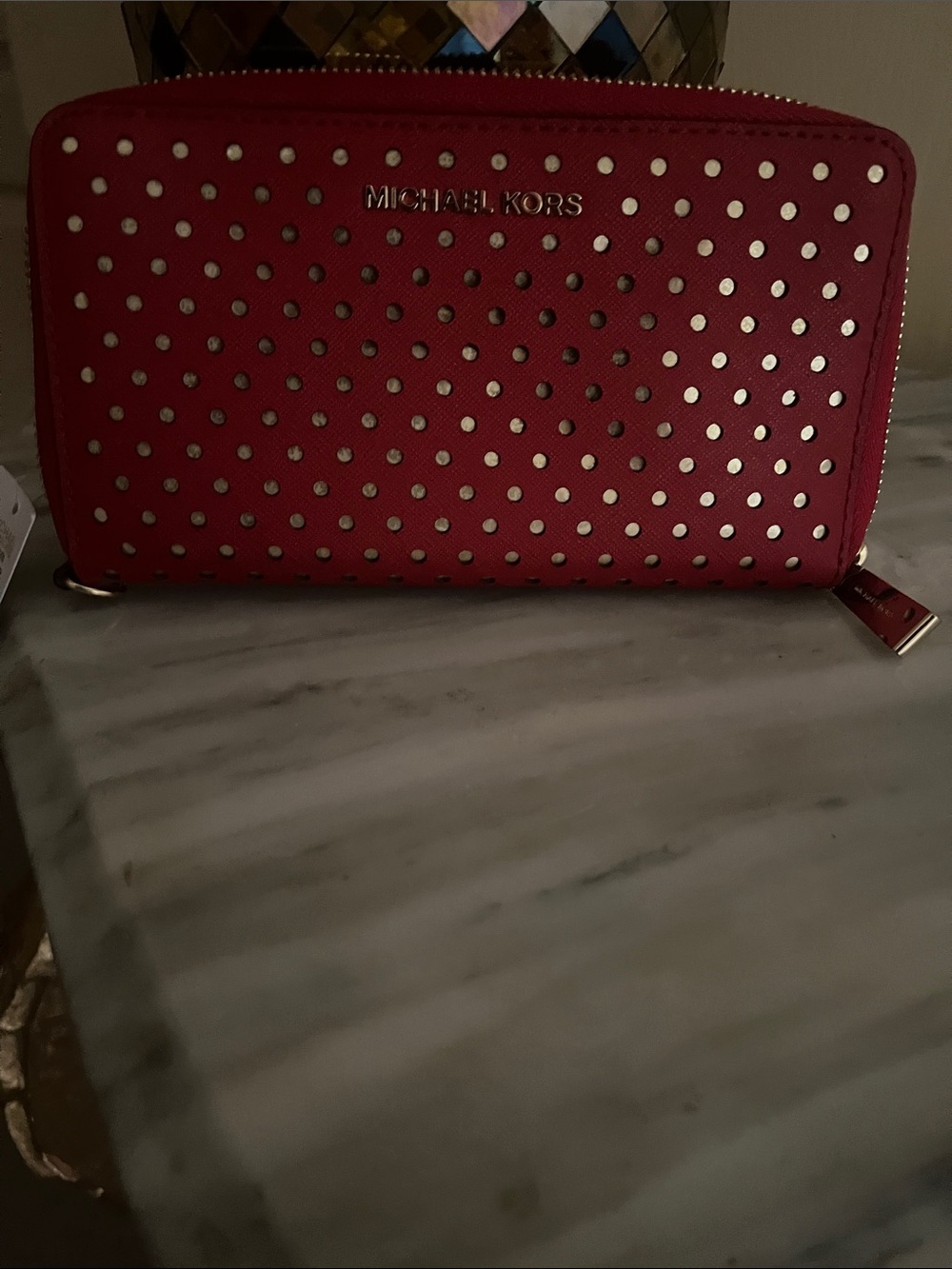 MICHAEL KORS Red Perforated Zip-Around Wallet with Gold Accents